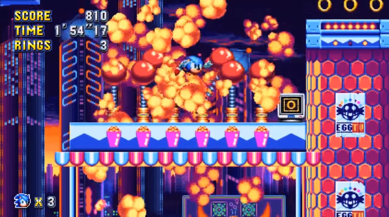 Is that a reference to a rare Sonic popcorn vending machine from 1993? Actually, it is. Fans know the deep stuff.